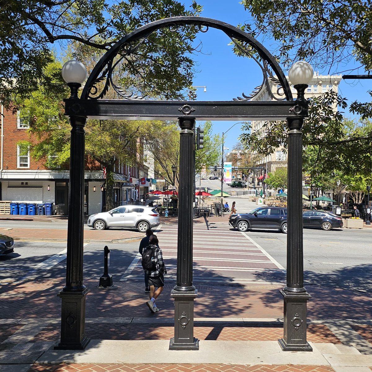 The cast-iron Arch at the entrance to the University of Georgia's North Campus, downtown Athens behind it.